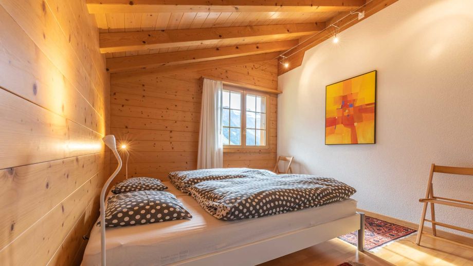 Schlafzimmer CHRIMITH Ferienwohnung Adelboden